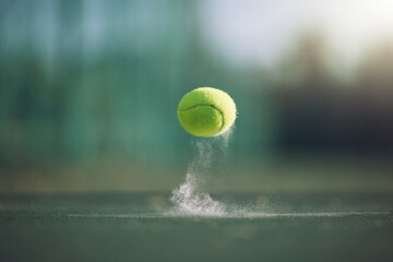 Sports, tennis and a ball bouncing on a court outdoor during a game, competition or training with chalk. Fitness, exercise and club with still life sport equipment outside for a workout or match - Powered by Adobe