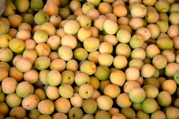 fresh plum or yellow plum background for sale in fruit market