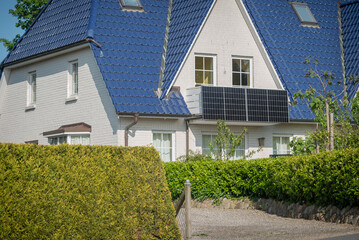 Balcony solar power station eco-friendly to use renewable energy. Solar power plant on a balcony to...