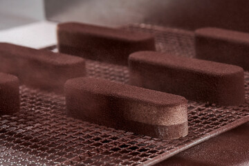 Beautiful confectioner's chocolate cake in the making 