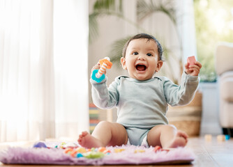 Portrait, smile and happy baby with toys on floor for fun, playing and game at home. Face, excited and toddler boy with creative building blocks for child development, learning or play in living room - Powered by Adobe