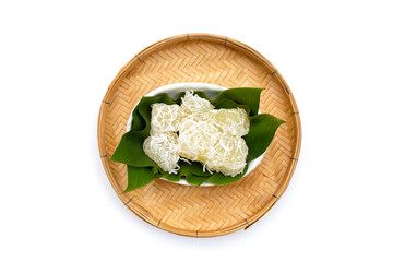 Steamed tapioca cake or cassava cake with grated coconut