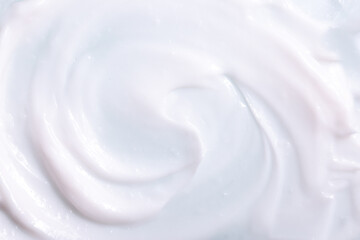 Skin cream texture. Background with smeared white cream. Moisturizing lotion for face and body.