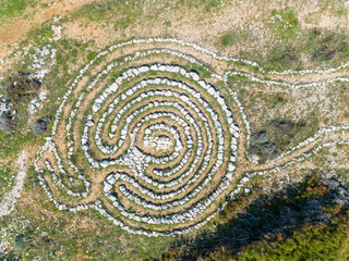 Aerial view of mystical stone formation on the coast of Kamenjak in Istria, Croatia.