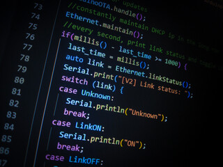Programming code on a computer screen. Source code photo. Technology background.