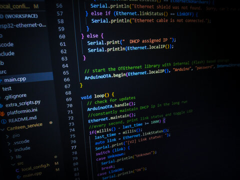 Programming code on a computer screen. Source code photo. Technology background.