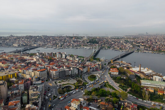 Aerial view of Ataturk bridge and Galata bridge crossing the Golden Horn river estuary in Istanbul European side, Beyoglu, Turkey.