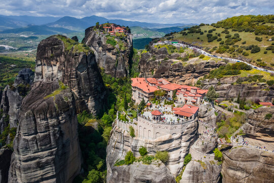 Aerial view of Iera Moni Barlaam Monastery and the Great Meteoron Monastery on natural pillar rock formation in Meteora, Trikala, Thessaly, Greece.