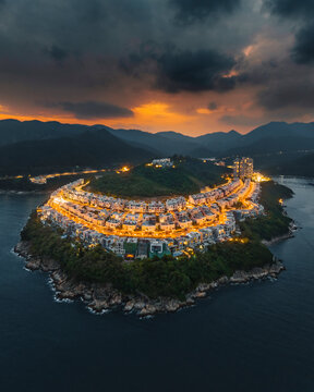 Aerial view of a small wealthy residential district on the cliffs kat Redhill Peninsula along the coastline on Hong Kong Island.