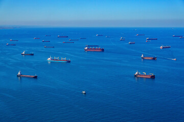 Aerial view of anchored ships waiting their turn to enter the Bosphorus at the Black Sea coast of Istanbul, Turkey.