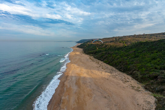 Aerial view of paramotor flying in Sahilkoy shoreline on the Black Sea coast at the Asian side of Istanbul, Turkey.
