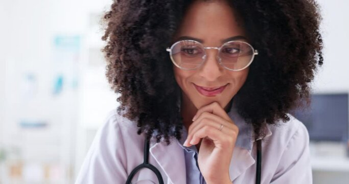 Healthcare, woman and doctor confused, online reading and mistake with review in hospital. Female worker, consultant or medical professional with doubt, confusion and thinking with ideas and a smile