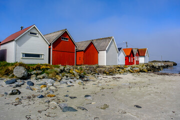Row Or Line Of Traditional Colourful Beach Huts