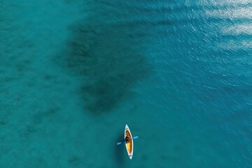 Sportsman swims on a kayak in the sea, drone view of a kayak in the sea, generative AI.