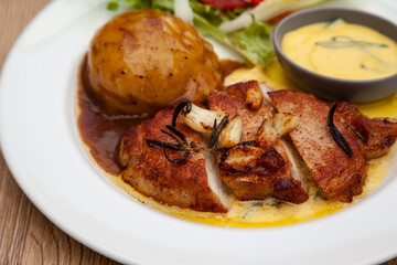 Pork sirloin steak with mash potato and bearnaise sauce