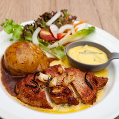 Pork sirloin steak with mash potato and bearnaise sauce