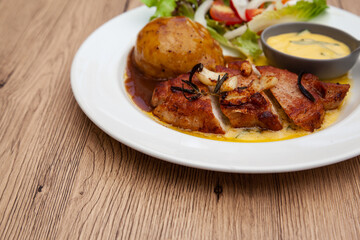 Pork sirloin steak with mash potato and bearnaise sauce