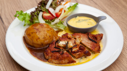 Pork sirloin steak with mash potato and bearnaise sauce