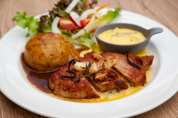 Pork sirloin steak with mash potato and bearnaise sauce