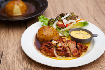 Pork sirloin steak with mash potato and bearnaise sauce
