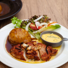 Pork sirloin steak with mash potato and bearnaise sauce