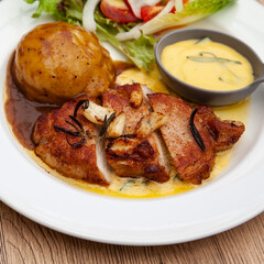 Pork sirloin steak with mash potato and bearnaise sauce