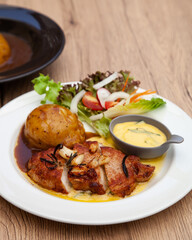 Pork sirloin steak with mash potato and bearnaise sauce