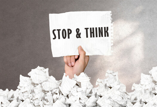 Text stop and think typed on retro typewriter