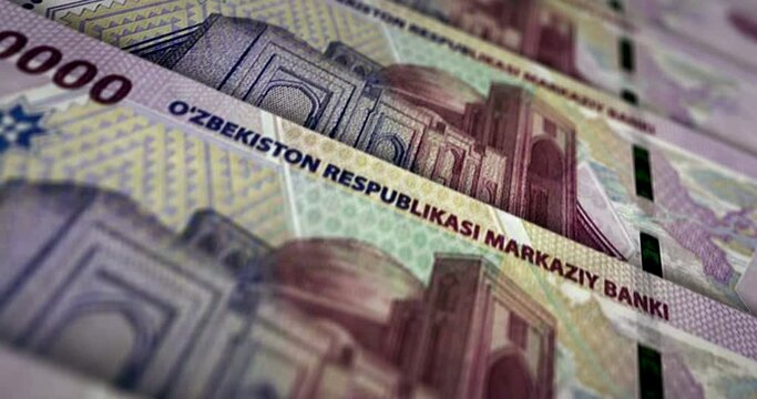 Uzbekistan money Uzbek Sum banknote loop. UZS money texture. Concept of economy, business, crisis, banking, recession, debt and finance. Moving over note. Loopable seamless 3d animation.