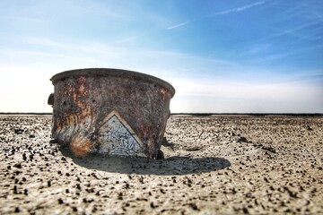 old rusty bucket, environmental pollution 