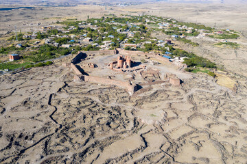 Obraz premium Drone view of medieval Dashtadem Fortress on sunny summer day. Aragatsotn Province, Armenia.