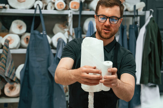 Bandages the raw material. Technician working in modern laboratory