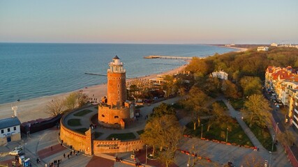 Harbour, lighthouse and pier in Kolobrzeg, Poland. - obrazy, fototapety, plakaty
