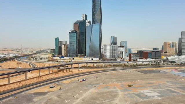 Riyadh: Aerial view of capital city of Saudi Arabia, modern city skyline, skyscrapers of King Abdullah Financial District (KAFD) - landscape panorama of Arabian Peninsula from above

