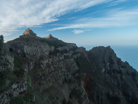 View of sharp peaks of La Merica mountain cliffs. Seen from Camino La Merica hiking trail. Arure, Valle Gran Rey , La Gomera, Canary Islands, Spain.