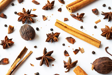 Dried star anise, cinnamon sticks and whole cardamon. Natural herbal spices seasoning collection.