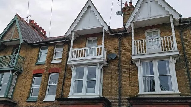 Traditional English houses, view of a terraced house in a small seaside village.