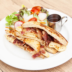 French toast with omelette and bacon for breakfast, brunch