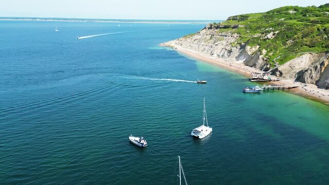 Needles beach, Isle of Wight, UK 2023 - Flying over boats towards the chairlift