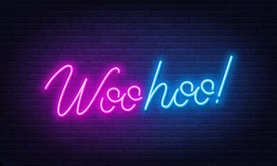 Woohoo neon sign on brick wall background.