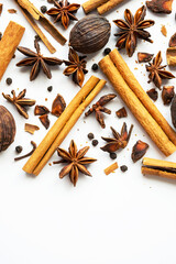 Fototapeta na wymiar Dried star anise, cinnamon sticks and whole cardamon. Natural herbal spices seasoning collection.
