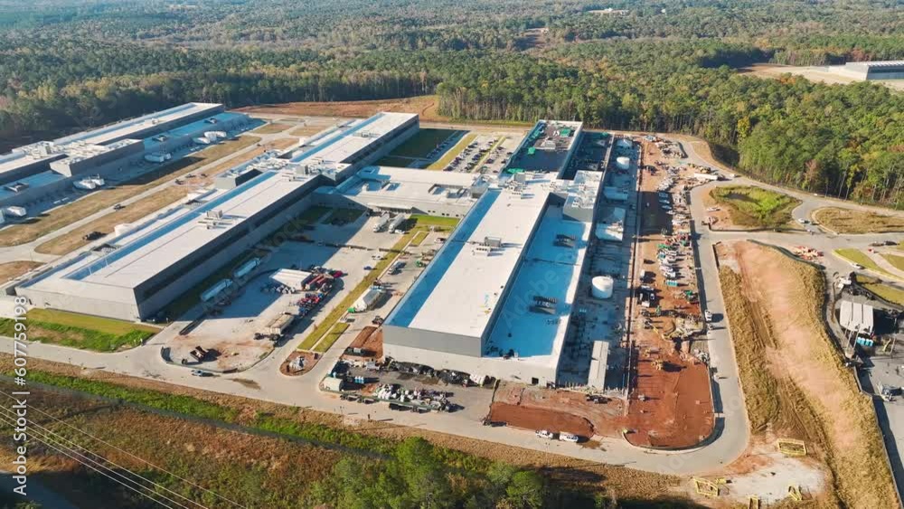 Poster Top view of large building site of new factory complex under construction. Development of industrial manufacturing economy sector