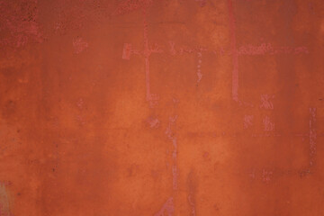 Rusty red abstract texture. A red and orange background.