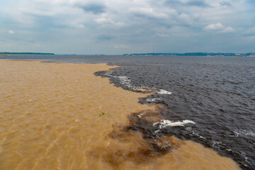 photo of mixing nature waterscape meeting waters. nature waterscape of river.