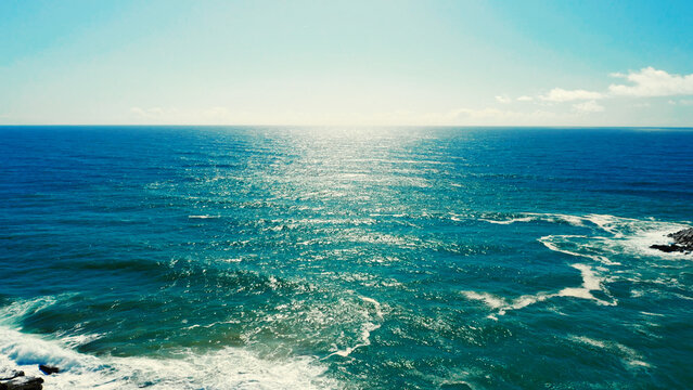 Beautiful Atlantic ocean during sunny day  - top view. Beautiful water landscape of deep blue sea . Aerial View of ocean with skyline. Relax and meditation concept. Oceanscape - Drone view.