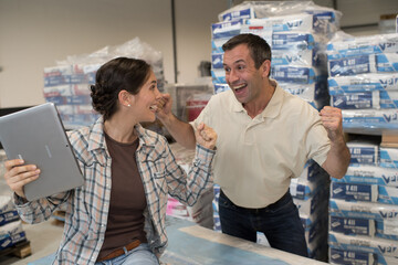 marketing workers laughing while working