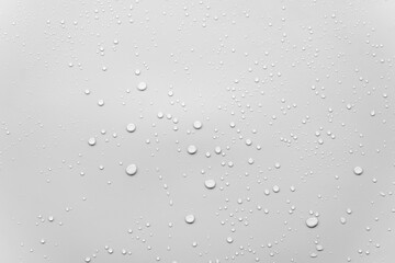 Water or rain drops on gray background 