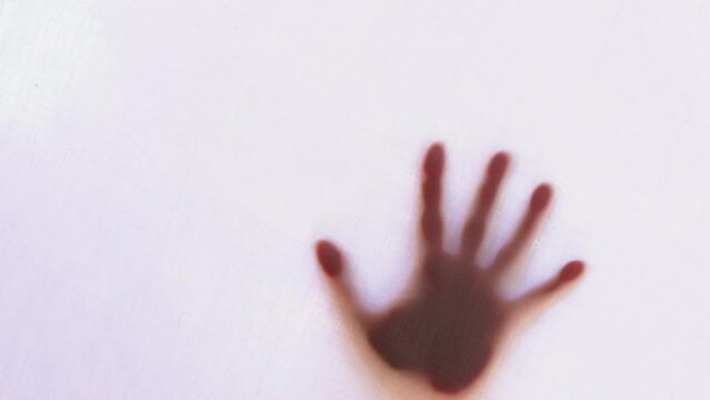eerie blurry hands of people, ghost as if they have been trapped behind glass, fabric, wrap, spirit trying to reach out from afterlife, concept of violence, nightmares, halloween horror, friday 13th