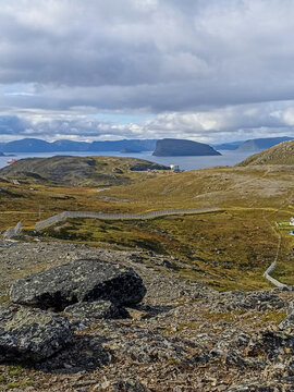 The view of Haja island and wild nature around Hammerfest in Norway from the top of Tyven Mountain