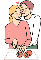 Happy couple in love cooking together